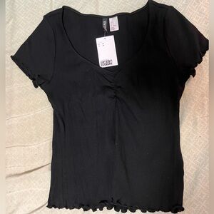 Black lettuce trim shirt